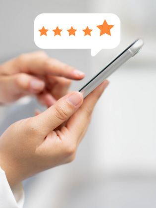 Person holding smart phone leaving a 5 BUNQ Online Google review