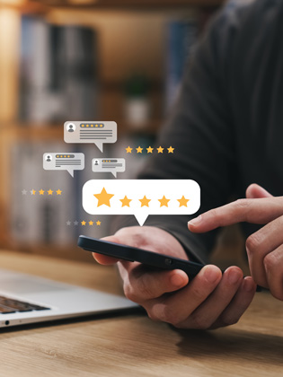 Person holding phone while leaving a 5 BUNQ Online Google review